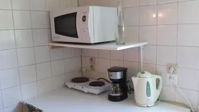 Cuisine ou kitchenette dans l'établissement Détente au bord de la rivière