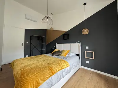 Un ou plusieurs lits dans un hébergement de l'établissement Casa Cosy