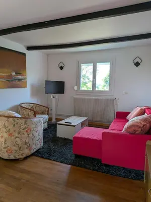 Coin salon dans l'établissement Apartment