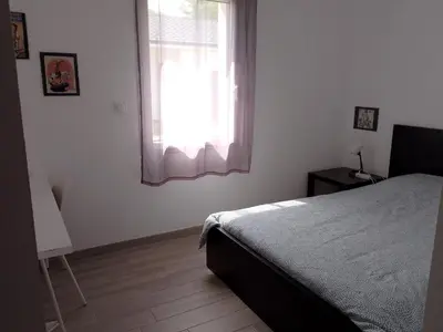Un ou plusieurs lits dans un hébergement de l'établissement Chambre avec salle de bain et WC privés