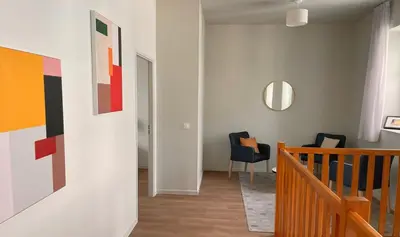 Coin salon dans l'établissement Zenao Appart'hôtels Cognac