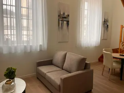 Coin salon dans l'établissement Zenao Appart'hôtels Cognac