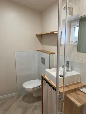 Salle de bains dans l'établissement Cottage 50m de la plage