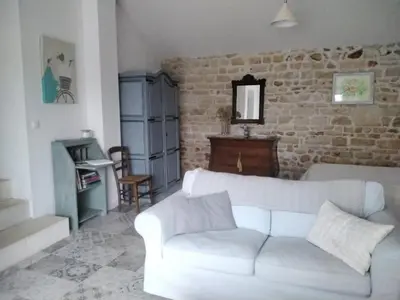 Coin salon dans l'établissement Charming pied-à-terre