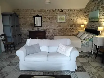 Coin salon dans l'établissement Charming pied-à-terre