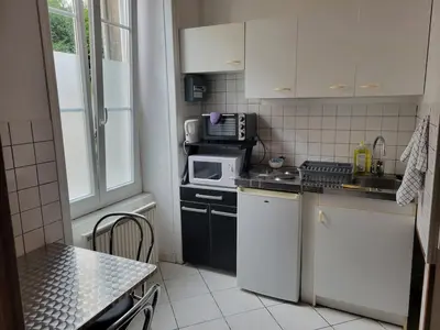 Cuisine ou kitchenette dans l'établissement Le Studio Parisien