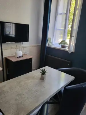 Télévision ou salle de divertissement dans l'établissement Studio non fumeur en rez-de-chaussée