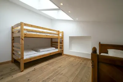Un ou plusieurs lits dans un hébergement de l'établissement Maison Les Rives de Fichemore - 7 chambres - Piscine
