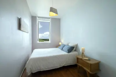 Un ou plusieurs lits dans un hébergement de l'établissement Maison Les Rives de Fichemore - 7 chambres - Piscine