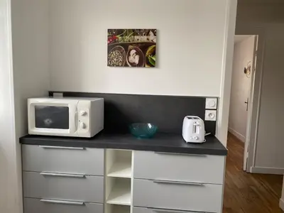 Cuisine ou kitchenette dans l'établissement Cosy 2 bedroom apartment