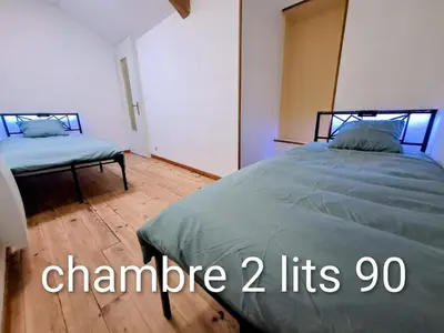 Un ou plusieurs lits dans un hébergement de l'établissement Namasté 'Au vieux Poitiers'