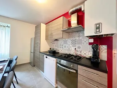 Cuisine ou kitchenette dans l'établissement La parenthèse Chic & Cosy - 8 min du Futuroscope !