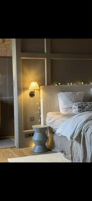 Un ou plusieurs lits dans un hébergement de l'établissement Le Cottage des Compagnons - Superbe gite atypique