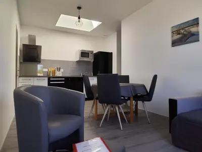 Cuisine ou kitchenette dans l'établissement Appartement T3 idéalement situé