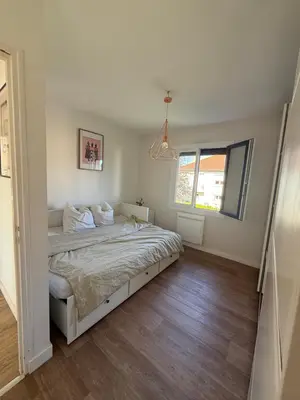 Un ou plusieurs lits dans un hébergement de l'établissement appartement cosy poitiers université