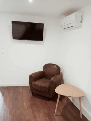 Coin salon dans l'établissement appartement