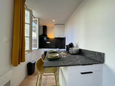 Cuisine ou kitchenette dans l'établissement El Nido - Numéro 3