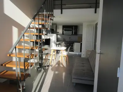 Cuisine ou kitchenette dans l'établissement Maisonnette avec terrasse et parking