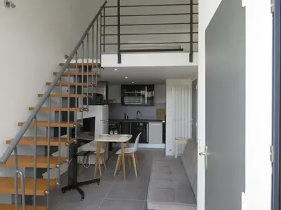 Cuisine ou kitchenette dans l'établissement Maisonnette avec terrasse et parking