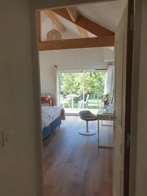 Coin salon dans l'établissement Chambre suite de charme