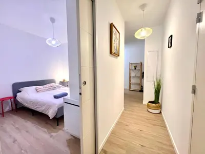 Un ou plusieurs lits dans un hébergement de l'établissement Beautiful 2 bedroom apartment in downtown Poitiers