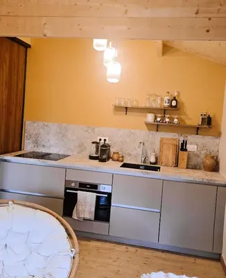 Cuisine ou kitchenette dans l'établissement Chalet romantique - Jacuzzi privatif - King size