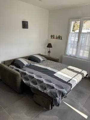 Un ou plusieurs lits dans un hébergement de l'établissement Chez Céline et Frédéric maison 3 T2 45m2