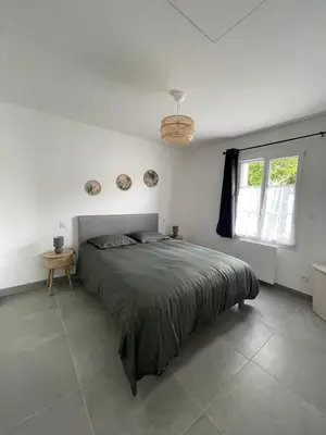 Un ou plusieurs lits dans un hébergement de l'établissement Chez Céline et Frédéric maison 3 T2 45m2