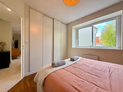 Un ou plusieurs lits dans un hébergement de l'établissement Le Spacieux Carat - Terrasse