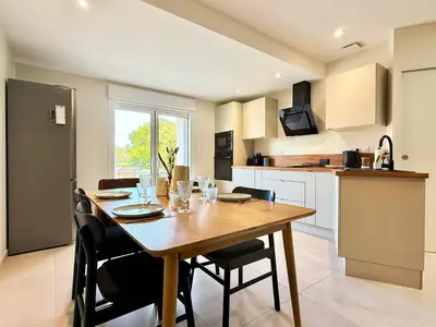 Cuisine ou kitchenette dans l'établissement Le Spacieux Carat - Terrasse