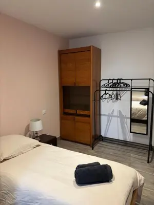 Un ou plusieurs lits dans un hébergement de l'établissement Maison au calme