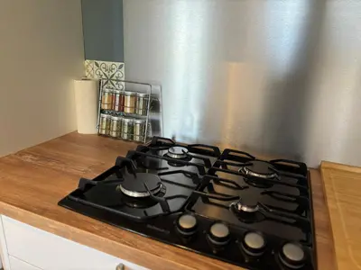 Cuisine ou kitchenette dans l'établissement Maison au calme