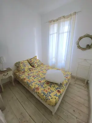 Un ou plusieurs lits dans un hébergement de l'établissement La Maison Blanche – Plage et centre