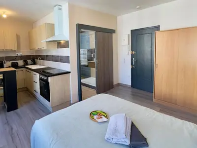 Cuisine ou kitchenette dans l'établissement Le Simplicity - Hyper Centre Cognac - wifi - stationnement