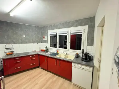 Cuisine ou kitchenette dans l'établissement Les grands prés