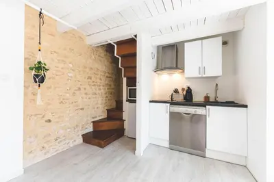 Cuisine ou kitchenette dans l'établissement Le gite du cedre