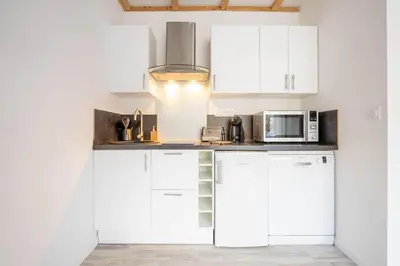 Cuisine ou kitchenette dans l'établissement Le gite de l'erable