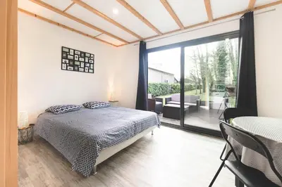 Un ou plusieurs lits dans un hébergement de l'établissement Le gite du prunus