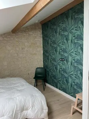 Un ou plusieurs lits dans un hébergement de l'établissement Le troglo du chateau