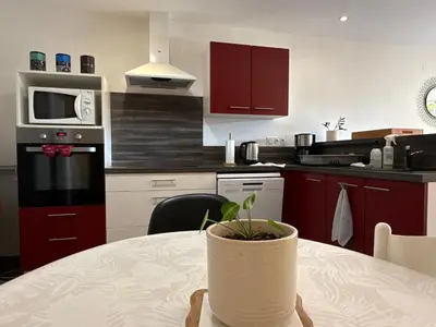 Cuisine ou kitchenette dans l'établissement Le Hameau des possibles gites 16- personnes