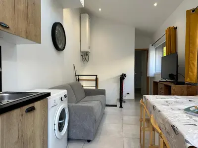 Cuisine ou kitchenette dans l'établissement Chez Camille & Emma - Loft Climatisé
