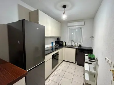 Cuisine ou kitchenette dans l'établissement Le Patis