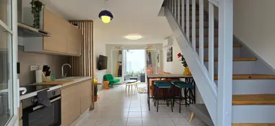 Cuisine ou kitchenette dans l'établissement Nouveau ! Le Pop Appart - Fun et coloré en hypercentre de Surgères