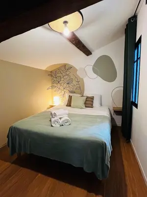 Un ou plusieurs lits dans un hébergement de l'établissement Gîte L'Udik option 2 escape game