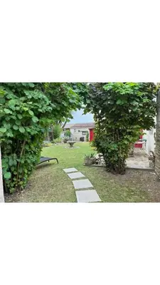 Jardin de l'établissement Maison Le puits du bonheur