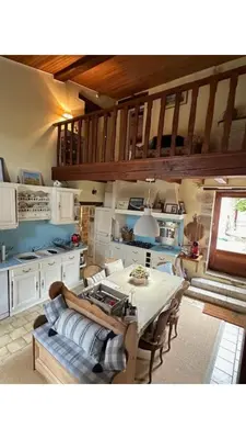 Cuisine ou kitchenette dans l'établissement Maison Le puits du bonheur