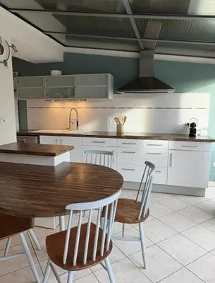 Cuisine ou kitchenette dans l'établissement La Laula