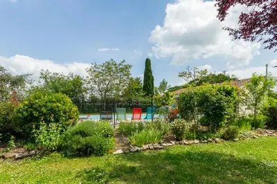 Jardin de l'établissement Maison 15p piscine chauffé terrain de pétanque