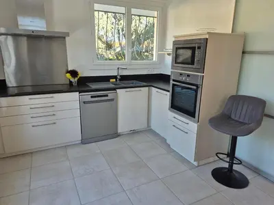 Cuisine ou kitchenette dans l'établissement Les Camelias