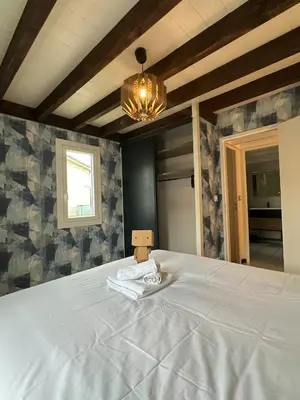 Un ou plusieurs lits dans un hébergement de l'établissement Maison Qualit'Home 8p - Jardin - Angoulême 5min